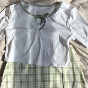 A very nice green skirt/shirt set!